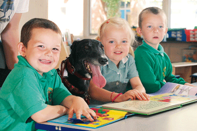 Britain's first official reading dog gets to work