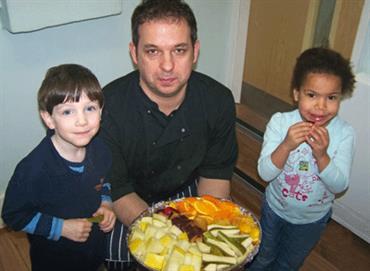 Chef Jason Waters with children at Woodlands nursery