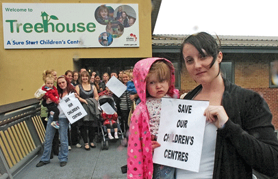 Kimberley Curtis and daughter join protesters at the Treehouse children's centre