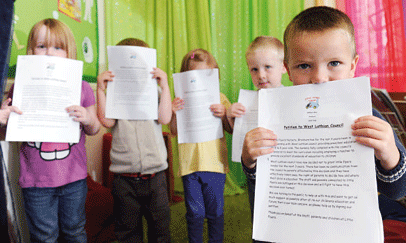 Children from Little Flyers Too, Broxbourn, with petitions to West Lothian Council