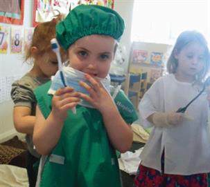 Children from Kids Allowed nursery in Cheadle play dentists