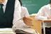 Research shows that putting two children through private education and university can cost £600,000 (Photograph: Alamy)