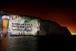 Carlsberg's new slogan projected on the Dover cliffs