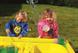 The outdoor area allows children to work on a larger and messier scale