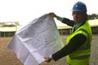 Blue Diamond managing director Alan Roper with his plans for an Octagonal planteria in the Channel Islands - photo: HW