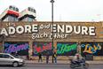 Graffitt: Ben Eine painted a wall in east London in support of Shelter's campaign
