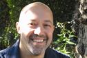 Leading garden designer Andrew Wilson says he is to resign as RHS chairman of assessors after 