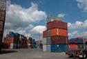 Trade deficit narrows as British firms expand abroad