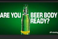 Get your beer belly out: Carlsberg asks commuters if they are 'beer body ready'