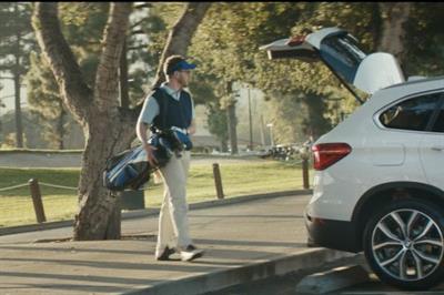 BMW swerves into humor in new spots