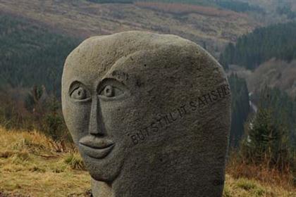 Attraction: The Talking Head statue in the Forest of Ae, Scotland (Credit: Forestry Commission scotland)