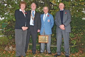 Rotary Club members unveil plaque at NEC