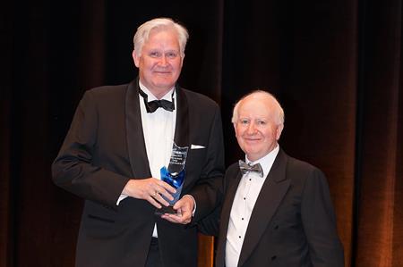 Henrik von Arnold receives his Academy Award for Europe from IMEX's Ray Bloom