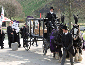 Unite, Unison and SCVO 'funeral' outside Scottish Parliament (picture by Douglas Robertson)