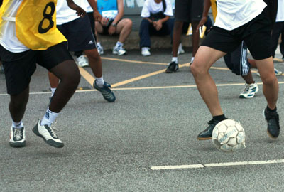 Charities provide recreation activities, including football