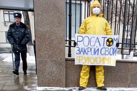 Controversy: an activist outside Rosatom’s base in Moscow (PA Photos)