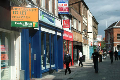 Sign of the times: Many shopping parades have empty premises