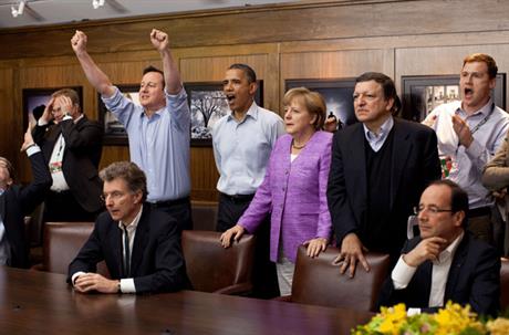 Politicians watch football game