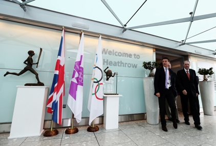 Olympic task: Lord Coe greets IOC president Jacques Rogge at Heathrow