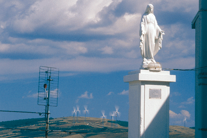 An early IVPC wind farm in the distance at Montefalcone, Campania