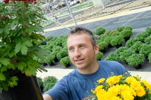 Former Lehman Brothers employee Phil Sinclair now a manager at Golden Acres Nursery - photo: Golden Acres Nursery