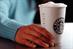Starbucks bows to pressure over UK tax