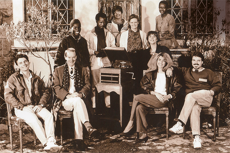 One tradition at The Jupiter Drawing Room is the annual staff photograph, taken every year since this first one, shot in 1990 outside the agency’s humble office