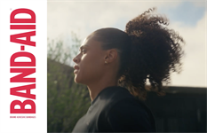 Band-Aid hits the pavement with an Olympic runner for the Boston Marathon