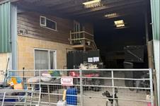 Woman faces jail over illegal home concealed within barn