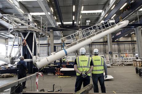 Each arm of the test turbine has a footbridge from the central technician platform to nacelle