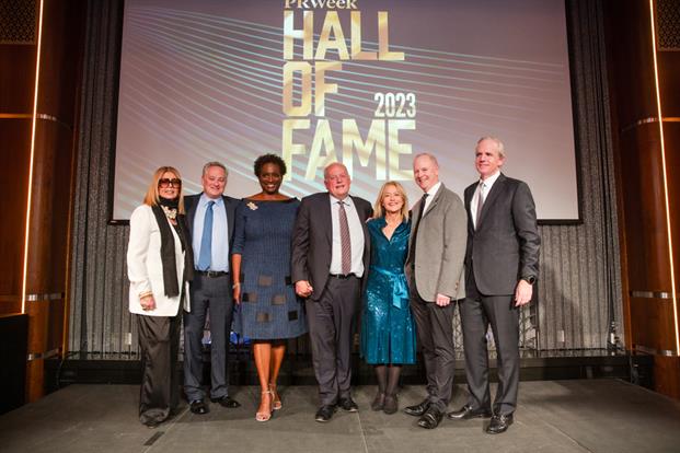 The honorees at PRWeek's Hall of Fame 2023 awards event include (from left to right) Maureen Lippe, Jonathan Adashek, Vickee Jordan Adams, Scott Allison, Hilary Rosen, Frank Shaw and Dan Bartlett. 
