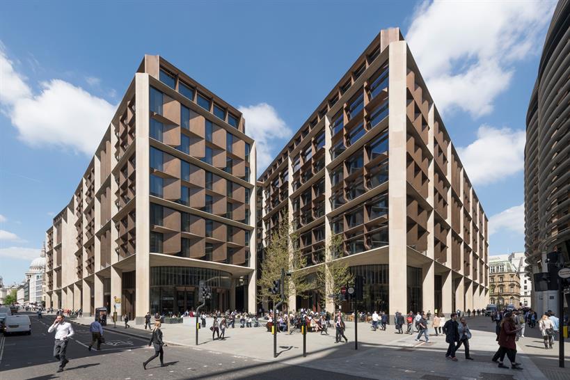 Two buildings divided by a pedestrianised dining arcade. Credit_ Nigel Young_Foster + Partners