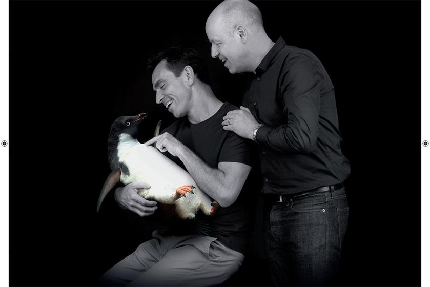 John Lewis, and Ben Priest, the executive creative director of adam&eveDDB, with Monty the penguin