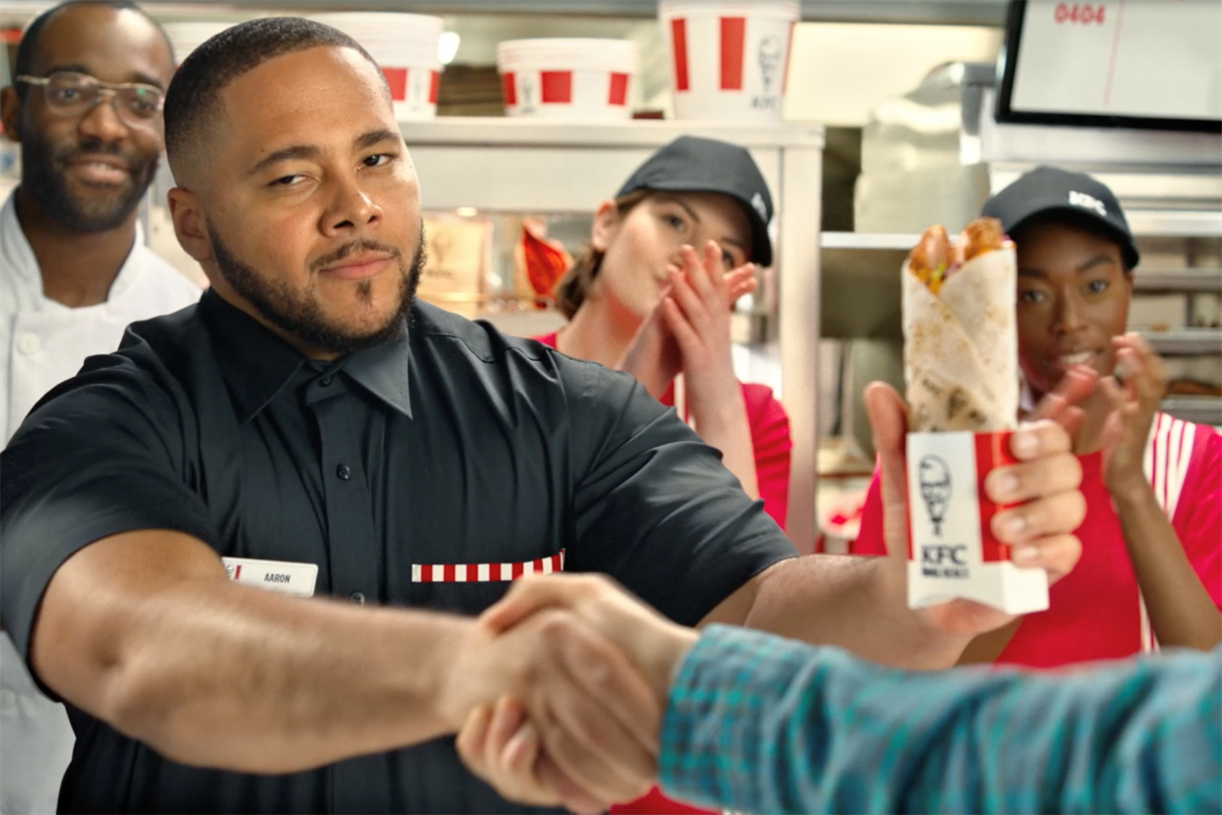 KFC emphasises value with cheesy handshake creative