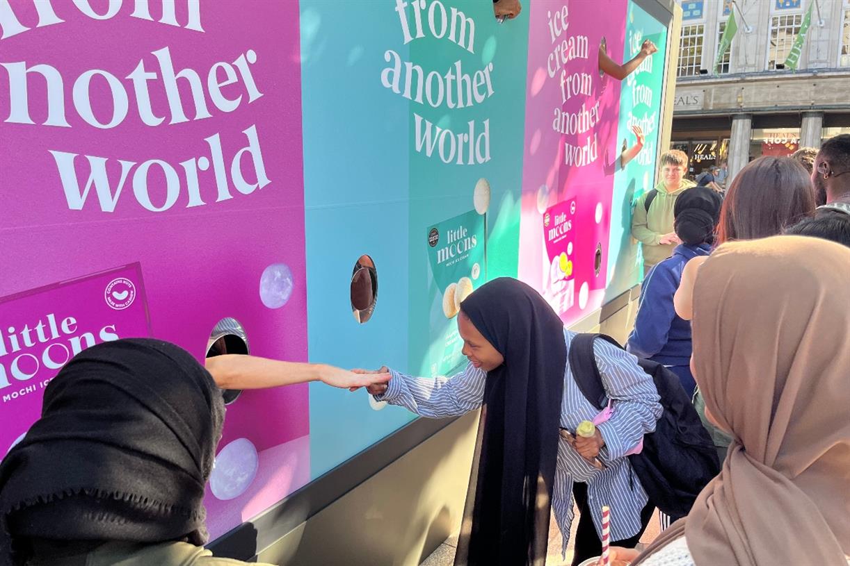 Little Moons billboard makes visitors reach for the sky