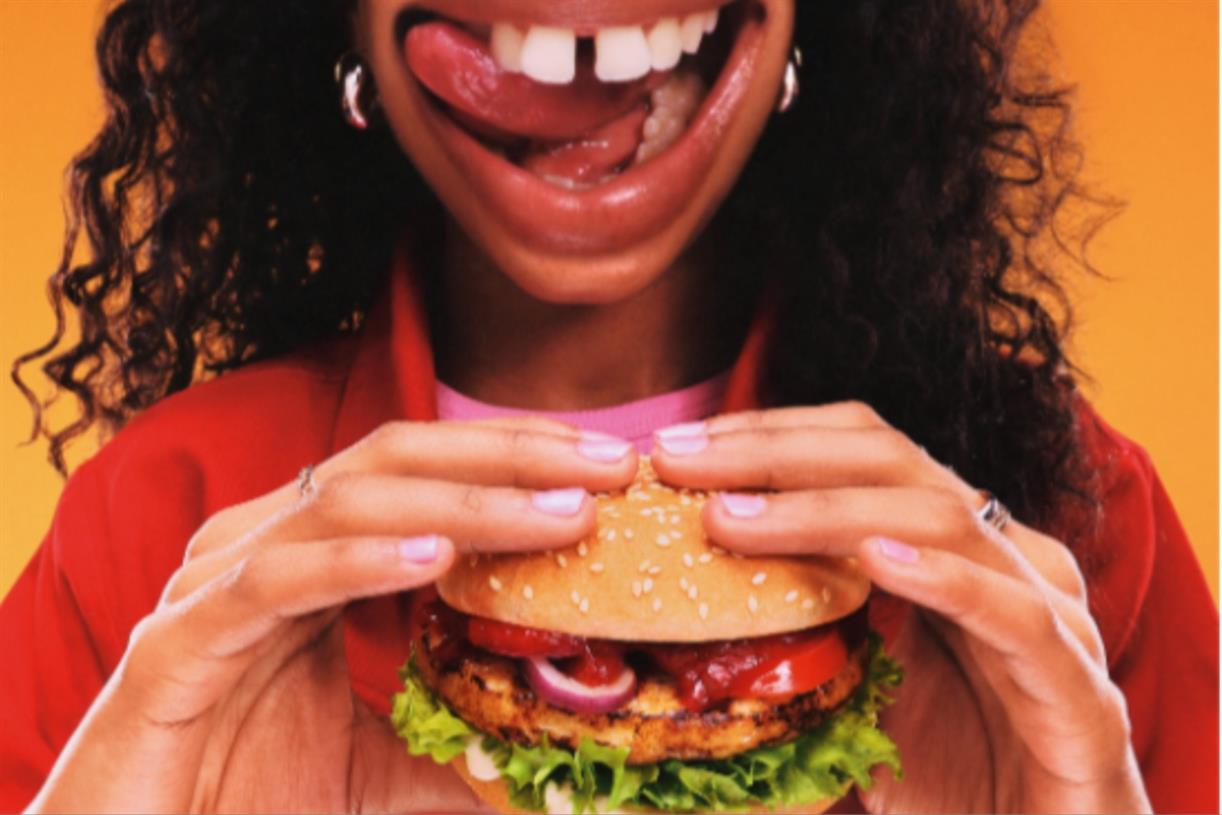 Rustlers surreal ad shows burger creating ballroom in woman's mouth