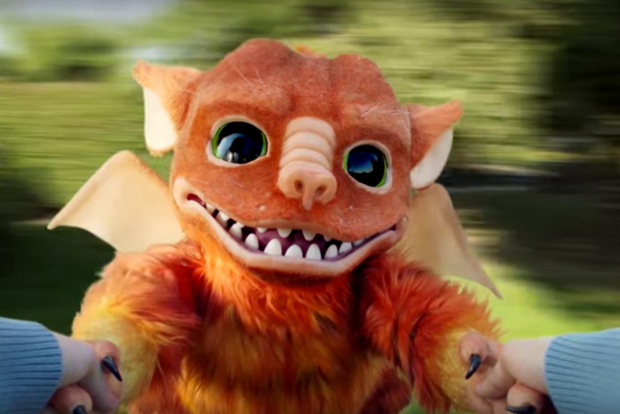 Can a baby dragon sum up the sensation of eating Doritos? Watch this ...