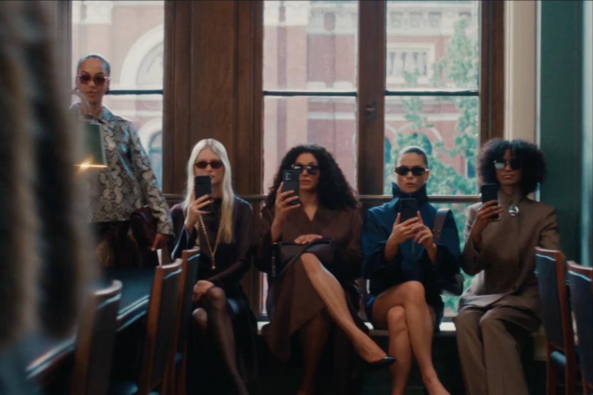 M&S coat steals the show in library-set fashion ad