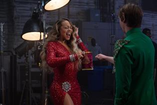 Pitch perfect: Mariah Carey uses her musical skills to earn the last packet of crisps