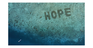 A giant coral billboard that is shaped as the word 'Hope' has won a Grand Prix at the Cannes Media Lions category