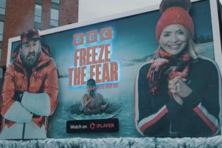 A billboard with presenters Lee Mack and Holly Willoughby in cold weather gear, and the title "BBC: Freeze with Fear".