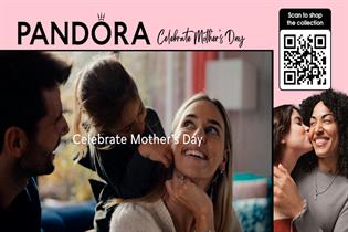 A still from a Pandora TV ad for Mother's Day, featuring a QR code