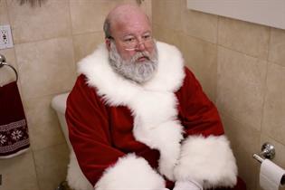 Santa: sitting on the loo in an ad for Poo-Pourri