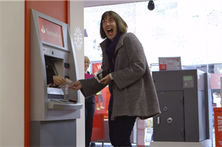Button handed customers £100 from inside the ATM