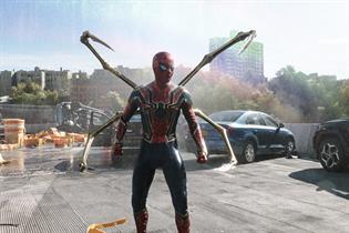 A scene from Spider-Man: No Way Home in which Spiderman has four spider legs coming our of his back