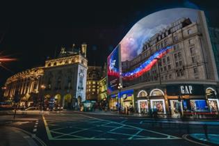 Piccadilly Circus billboard, with the Volt volt travelling across it.