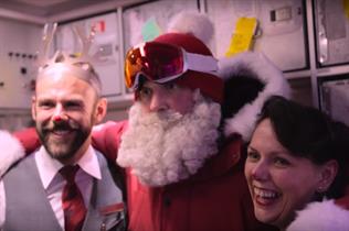 Santa surprised passengers on two Virgin Atlantic flights (YouTube/VirginAtlantic)