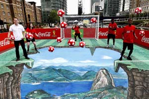 Michael Owen shows off football skills on Coca-Cola's 3D artwork 