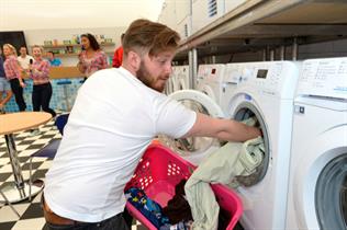 Festival-goers could load up their muddy clothes in the brand's washer-dryers (Leo Wilkinson)