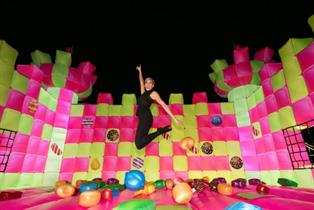 Alesha Dixon on the jelly-like bouncy castle in London